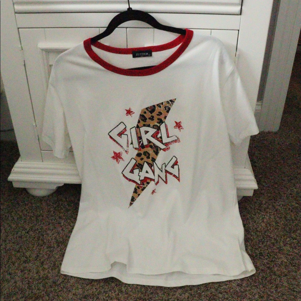 This top is fromThese Three Boutique in a size large. Perfect condition!